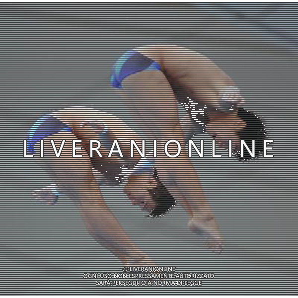 (110717) -- SHANGHAI, July 17, 2011 () -- Qiu Bo/Huo Liang (R) of China compete in the final of the men\'s 10m synchronized platform diving event at the 14th FINA World Championships in Shanghai, east China, July 17, 2011. Qiu Bo/Huo Liang of China claimed the title with 480.03 points. (/Yang Zongyou)(zgp)