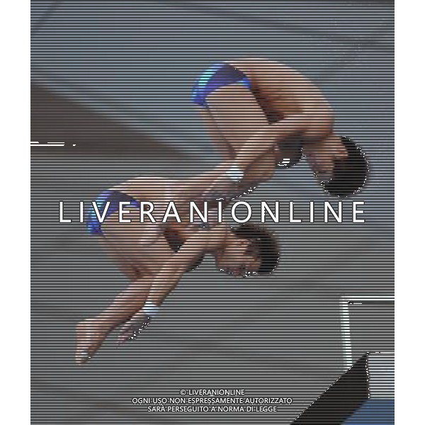 (110717) -- SHANGHAI, July 17, 2011 () -- Qiu Bo/Huo Liang (R) of China compete in the final of the men\'s 10m synchronized platform diving event at the 14th FINA World Championships in Shanghai, east China, July 17, 2011. Qiu Bo/Huo Liang of China claimed the title with 480.03 points. (/Yang Zongyou)(zgp)