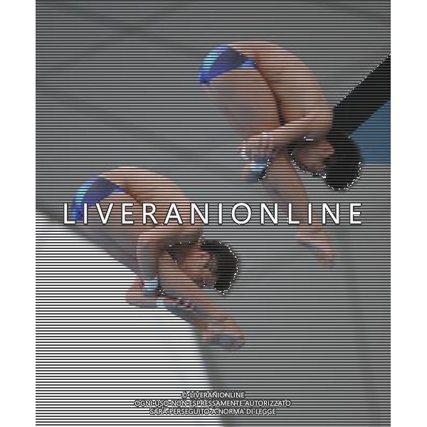 (110717) -- SHANGHAI, July 17, 2011 () -- Qiu Bo/Huo Liang (R) of China compete in the final of the men\'s 10m synchronized platform diving event at the 14th FINA World Championships in Shanghai, east China, July 17, 2011. Qiu Bo/Huo Liang of China claimed the title with 480.03 points. (/Yang Zongyou)(zgp)
