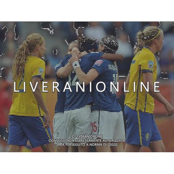 (110716) -- SINSHEIM, July 16, 2011 () -- France\'s Elodie Thomis (No. 12) celebrates her goal with teammates during the third place final match between Sweden and France at the 2011 FIFA Women\'s World Cup in Sinsheim, Germany, July 16, 2011. Sweden beat France 2-1 and claimed the third place of the 2011 FIFA Women\'s World Cup. (/Ma Ning) (zw)