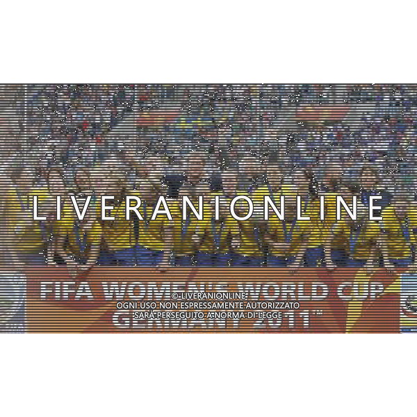 (110716) -- SINSHEIM, July 16, 2011 () -- Sweden\'s players celebrate during the awarding ceremony after the third place final match between Sweden and France at the 2011 FIFA Women\'s World Cup in Sinsheim, Germany, July 16, 2011. Sweden beat France 2-1 and claimed the third place of the 2011 FIFA Women\'s World Cup. (/Ding Xu) (zw)