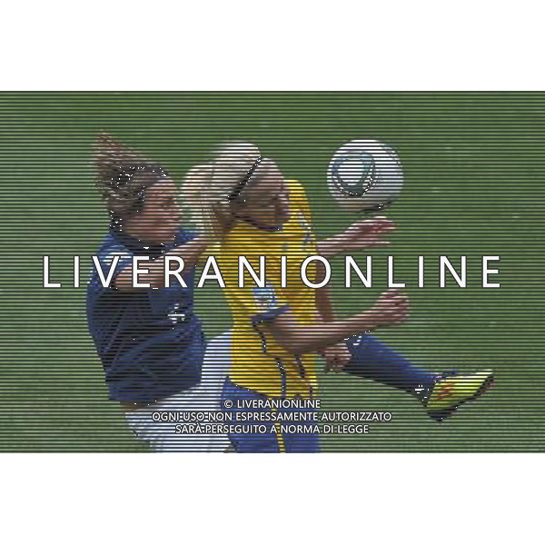 (110716) -- SINSHEIM, July 16, 2011 () -- Sweden\'s Lisa Dahlkvist (R) vies with France\'s Dandrine Soubeyrand during the third place final match between Sweden and France at the 2011 FIFA Women\'s World Cup in Sinsheim, Germany, July 16, 2011. Sweden beat France 2-1 and claimed the third place of the 2011 FIFA Women\'s World Cup. (/Wu Wei) (zw)