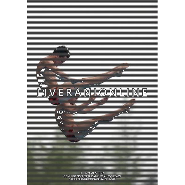 (110717) -- SHANGHAI, July 17, 2011 () -- Patrick Hausding/Sascha Klein of Germany compete in the preliminary round of the men\'s 10m synchronized platform diving event at the 14th FINA World Championships in Shanghai, east China, July 17, 2011. Patrick Hausding/Sascha Klein ranked the 3rd place with 441.12 points. (/Li Ming)