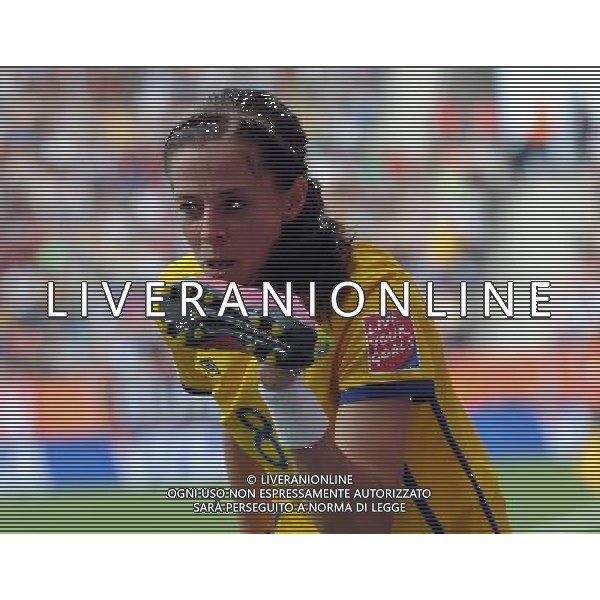 (110717) -- SINSHEIM, July 17, 2011 () -- Sweden\'s Lotta Schelin kisses her shoe to celebrate her goal during the third place final match between Sweden and France at the 2011 FIFA Women\'s World Cup in Sinsheim, Germany, July 16, 2011. Sweden beat France 2-1 and claimed the third place of the 2011 FIFA Women\'s World Cup. (/Ma Ning) (bxf)