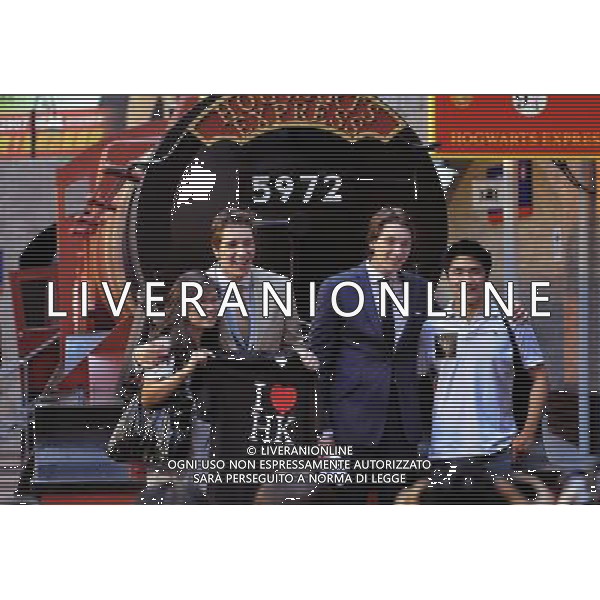 (110716) -- HONG KONG, July 16, 2011 () -- Cast members of Harry Potter and the Deathly Hallows - Part 2 James Phelps (3rd L) and Olive Phelps (2nd L), who portray the Weasley brothers, interact with fans in Hong Kong, south China, July 16, 2011. James and Olive Phelps came to Hong Kong on Saturday to promote the movie Harry Potter and the Deathly Hallows - Part 2. (/Chen Xiaowei) (zhs)