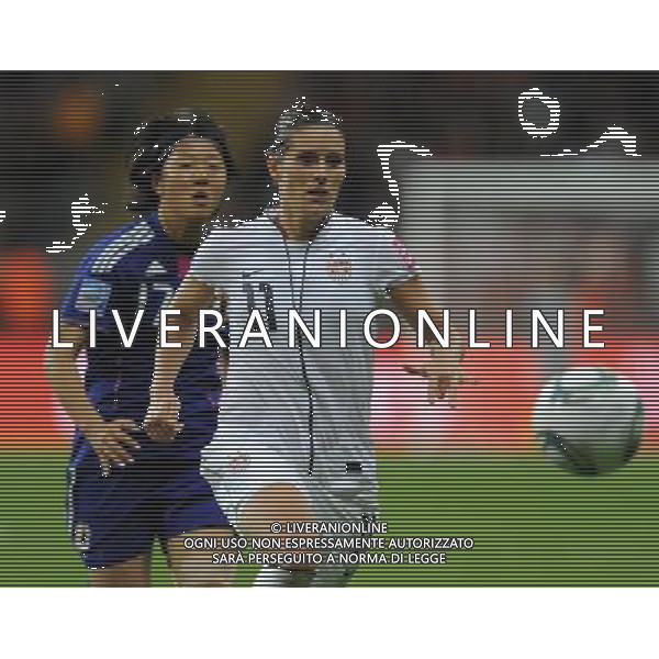 FRANKFURT, July 17, 2011 ()USA\'s Alex Krieger (R) vies for the ball during the final match between Japan and the United States at the 2011 FIFA Women\'s World Cup in Frankfurt, Germany, July 17, 2011. (/Xu Liang)