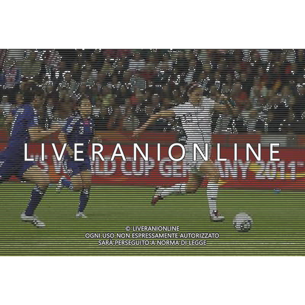 FRANKFURT, July 17, 2011 ()USA\'s Alex Morgan (R) dribbles during the final match between Japan and the United States at the 2011 FIFA Women\'s World Cup in Frankfurt, Germany, July 17, 2011. (/Ding Xu)