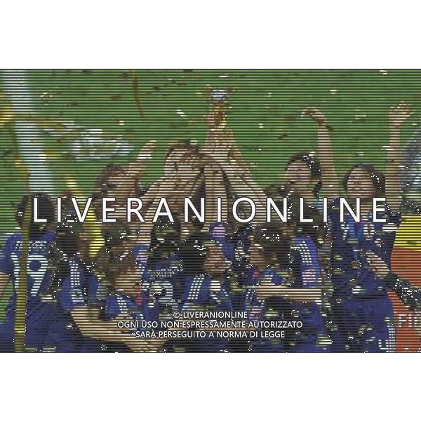 FRANKFURT, July 17, 2011 ()Japan\'s players celebrate their victory on the podium after the final match between Japan and the United States at the 2011 FIFA Women\'s World Cup in Frankfurt, Germany, July 17, 2011. Japan won the 2011 FIFA Women\'s World Cup after beating the USA on the penalty shootout. (/Wu Wei)