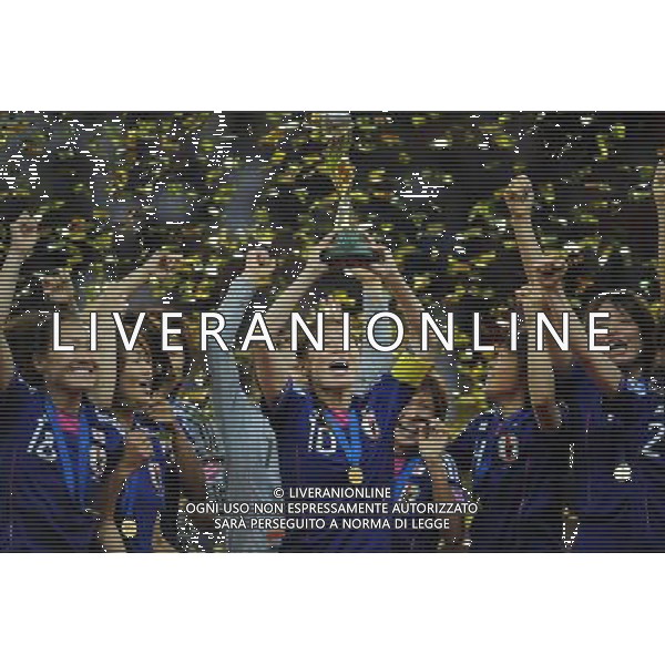 FRANKFURT, July 17, 2011 ()Japan\'s players celebrate their victory on the podium after the final match between Japan and the United States at the 2011 FIFA Women\'s World Cup in Frankfurt, Germany, July 17, 2011. Japan won the 2011 FIFA Women\'s World Cup after beating the USA on the penalty shootout. (/Li Jundong)