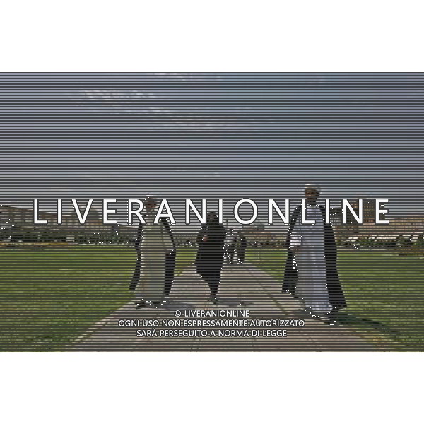 (110715) -- ISFAHAN, July 15, 2011 () -- Two Iranian clerics visit the Naghshe Jahan Square in Isfahan, 234 miles south of Tehran, capital of Iran, July 14, 2011. Constructed between 1598 and 1629, Isfahan is now an important historical site, and one of UNESCO\'s World Heritage Sites. (/Ahmad Halabisaz) (wjd)