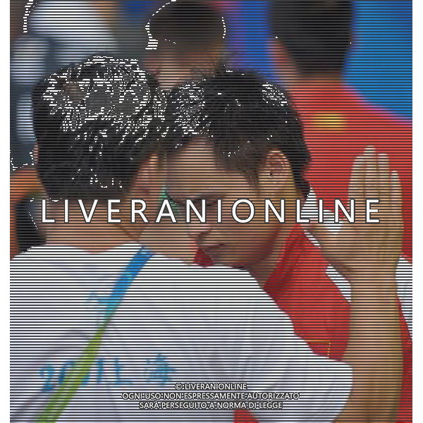 SHANGHAI, July 18, 2011 ()Li Shixin (R) of China listens to his coach Liu Henglin in the final of the men\'s 1m springboard diving event at the 14th FINA World Championships in Shanghai, east China, July 18, 2011. Li Shixin claimed the title with 463.90 points. (/Wang Yuguo) (zgp)