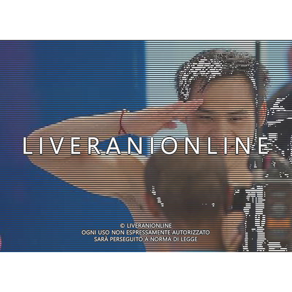 SHANGHAI, July 18, 2011 ()Li Shixin of China salutes to camera after winning gold medal in the final of the men\'s 1m springboard diving event at the 14th FINA World Championships in Shanghai, east China, July 18, 2011. Li Shixin claimed the title with 463.90 points. (/Fei Maohua) (zgp)