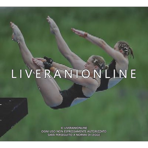 SHANGHAI, July 18, 2011 Alexandra Croak/Melissa Wu of Australia compete in the final of the women\'s 10m synchronized platform diving event at the 14th FINA World Championships in Shanghai, east China, July 18, 2011. Alexandra Croak/Melissa Wu of Australia grabbed the silver medal with 325.92 points. (/Guo Yong)