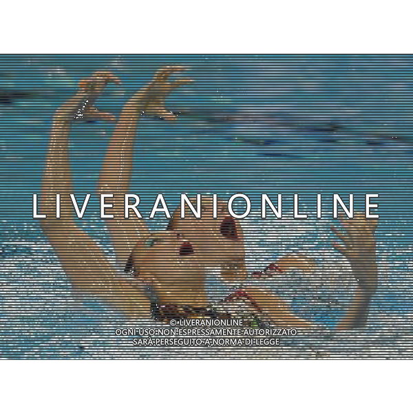 SHANGHAI, July 18, 2011 Natalia Ishchenko/Svetlana Romashina of Russia compete in the final of the technical duets of synchronized swimming event at the 14th FINA World Championships in Shanghai, east China, July 18, 2011. The Russian duet claimed the title with 98.200 points. (/Wang Yuguo) (zgp)