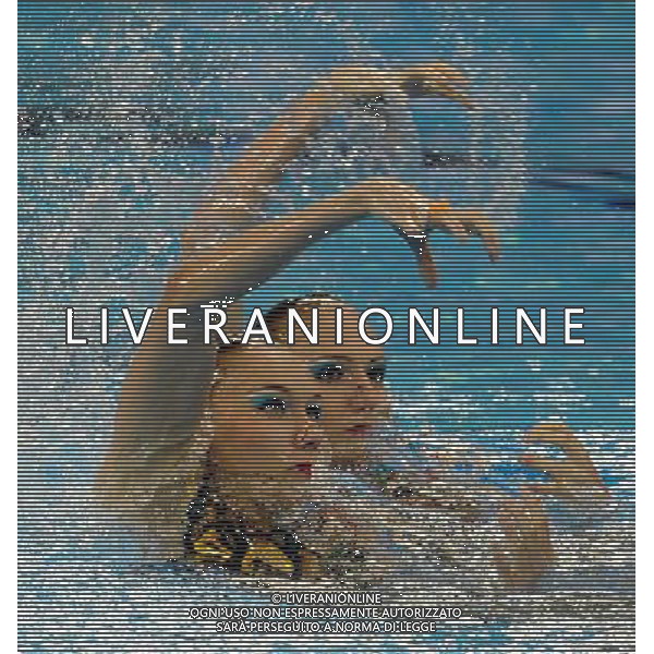 SHANGHAI, July 18, 2011 Natalia Ishchenko/Svetlana Romashina of Russia compete in the final of the technical duets of synchronized swimming event at the 14th FINA World Championships in Shanghai, east China, July 18, 2011. The Russian duet claimed the title with 98.200 points. (/Wang Yuguo) (zgp)