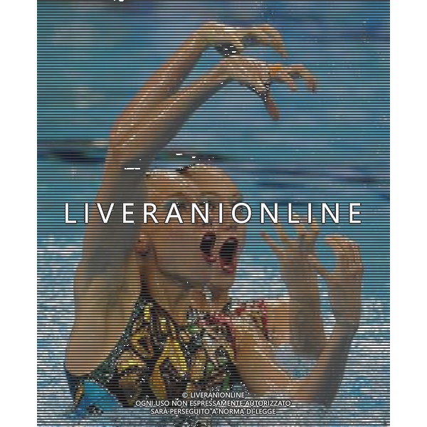 SHANGHAI, July 18, 2011 Natalia Ishchenko/Svetlana Romashina of Russia compete in the final of the technical duets of synchronized swimming event at the 14th FINA World Championships in Shanghai, east China, July 18, 2011. The Russian duet claimed the title with 98.200 points. (/Wang Yuguo) (zgp)