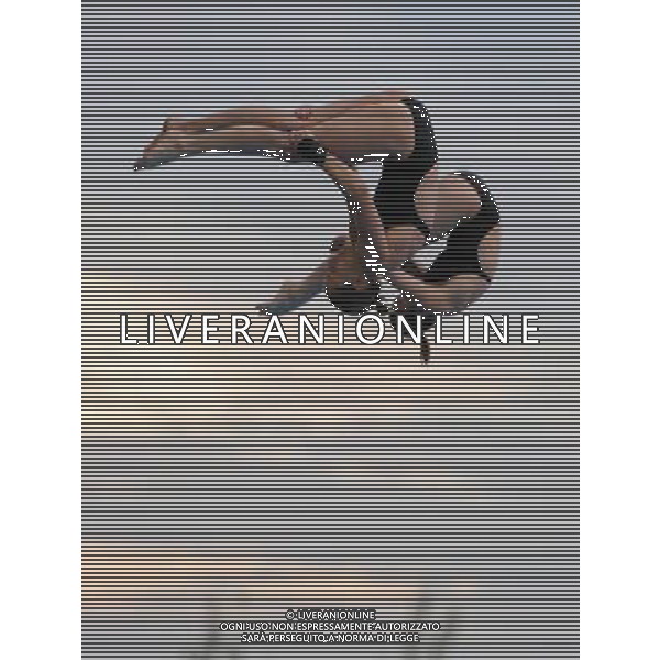 SHANGHAI, July 18, 2011 Alexandra Croak/Melissa Wu of Australia compete in the final of the women\'s 10m synchronized platform diving event at the 14th FINA World Championships in Shanghai, east China, July 18, 2011. Alexandra Croak/Melissa Wu of Australia grabbed the silver medal with 325.92 points. (/Guo Yong)(zgp)