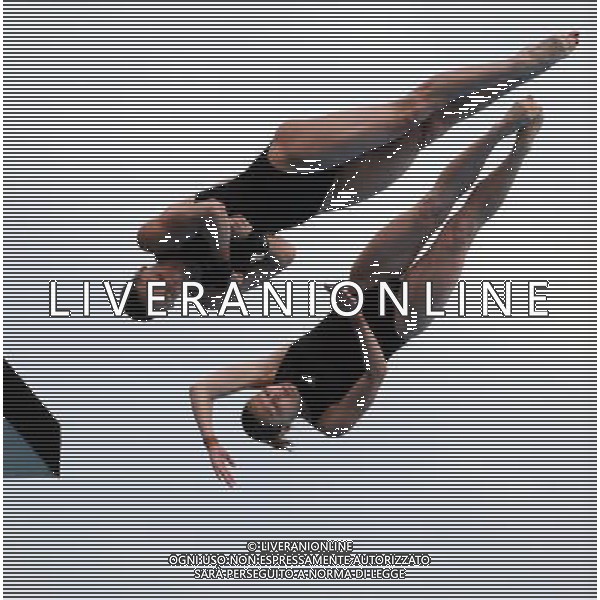 SHANGHAI, July 18, 2011 Alexandra Croak/Melissa Wu of Australia compete in the final of the women\'s 10m synchronized platform diving event at the 14th FINA World Championships in Shanghai, east China, July 18, 2011. Alexandra Croak/Melissa Wu of Australia grabbed the silver medal with 325.92 points. (/Guo Yong)(zgp)