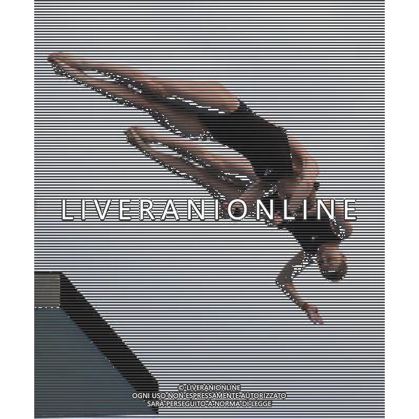 SHANGHAI, July 18, 2011 Alexandra Croak/Melissa Wu of Australia compete in the final of the women\'s 10m synchronized platform diving event at the 14th FINA World Championships in Shanghai, east China, July 18, 2011. Alexandra Croak/Melissa Wu of Australia grabbed the silver medal with 325.92 points. (/Guo Yong)(zgp)