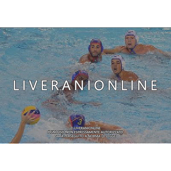 SHANGHAI, July 18, 2011 Players compete in the preliminary round of the men\'s water polo event between Kazakhstan and Spain at the 14th FINA World Championships in Shanghai, east China, July 18, 2011. Spain beat Kazakhstan with 18 5. (/Liu Ying) (sqq)