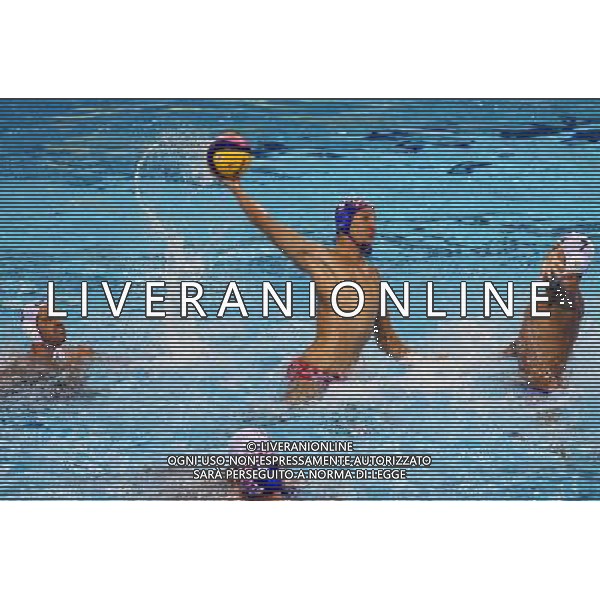 SHANGHAI, July 18, 2011 Sandro Sukno of Croatia (C) shoots in the preliminary round of the men\'s water polo event between Brazil and Croatia at the 14th FINA World Championships in Shanghai, east China, July 18, 2011. Croatia beat Brazil with 14 5. (/Liu Ying) (sqq)