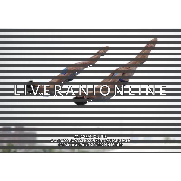 (110719) -- SHANGHAI, July 19, 2011 () -- China\'s Qin Kai/Luo Yutong (L) compete during the preliminary round of the men\'s 3m synchronized springboard diving event at the 14th FINA World Championships in Shanghai, east China, July 19, 2011. Qin Kai/Luo Yutong ranked first with 452.19 points. (/Yang Lei) (zgp)