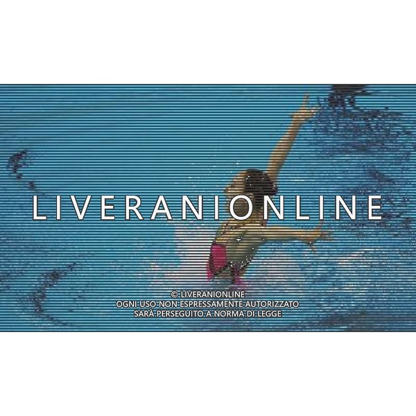 (110719) -- SHANGHAI, July 19, 2011 () -- A member of the Democratic People\'s Republic of Korea (DPRK)\'s team competes in the preliminary of the free combination of synchronized swimming event at the 14th FINA World Championships in Shanghai, east China, July 19, 2011. The team of the DPRK ranked the 9th with 84.340 points. (/Li Ming) (zgp)