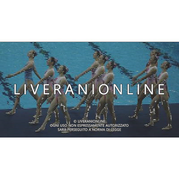 (110719) -- SHANGHAI, July 19, 2011 () -- China\'s team compete in the preliminary of the free combination of synchronized swimming event at the 14th FINA World Championships in Shanghai, east China, July 19, 2011. The Chinese team ranked second with 96.320 points. (/Li Ming) (zgp)