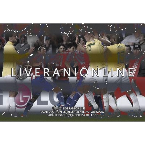 LA PLATA, July 18, 2011 ()Brazil\'s and Paraguay\'s soccer players react during the match of quarterfinals of Copa America 2011 between Brazil and Paraguay in La Plata, Argentina, July 17, 2011. Paraguay won 2 0. (Martin Zabala) (py)