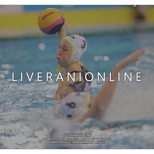 SHANGHAI, July 19, 2011 Sophie Elizabeth Smith (top) of Australia competes in the preliminary round of women\'s water polo event between Australia and New Zealand at the 14th FINA World Championships in Shanghai, east China, July 19, 2011. Australia won the match 12 4. (/Yang Zongyou)