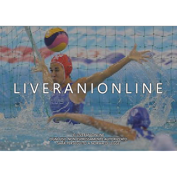 SHANGHAI, July 19, 2011 Eleni Kouvdou (L) of Greece defends during the preliminary of the women\'s waterpolo between Greece and Brazil at the 14th FINA World Championships in Shanghai, east China, July 19, 2011. Greece won 11 8. (/Yang Zongyou) (lm)