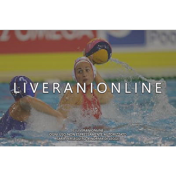 SHANGHAI, July 19, 2011 Maria Del Pilar Pena Carrasco (R) of Spain competes in the preliminary round of women\'s water polo event between Spain and Russia at the 14th FINA World Championships in Shanghai, east China, July 19, 2011. Russia won the match 18 8. (/Yang Zongyou) (sqq)