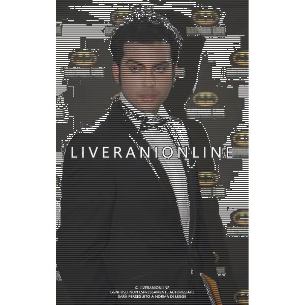 Sikander Malik on the red carpet at the world premiere of Batman Live at the Manchester Evening News Arena, Manchester, England, 19th July 2011. Photograph by Mike Gray/LFI
