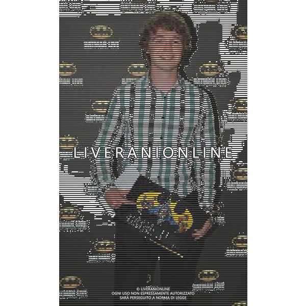 Ben Ryan Davies on the red carpet at the world premiere of Batman Live at the Manchester Evening News Arena, Manchester, England, 19th July 2011. Photograph by Mike Gray/LFI