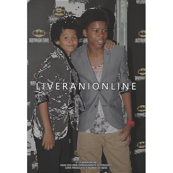 Members of boy band New Bounce on the red carpet at the world premiere of Batman Live at the Manchester Evening News Arena, Manchester, England, 19th July 2011. Photograph by Mike Gray/LFI