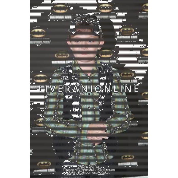 Ellis Hollins on the red carpet at the world premiere of Batman Live at the Manchester Evening News Arena, Manchester, England, 19th July 2011. Photograph by Mike Gray/LFI