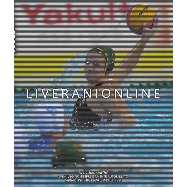 SHANGHAI, July 19, 2011 Kelsey White (back) of South Africa competes in the preliminary round of women\'s water polo event between Italy and South Africa at the 14th FINA World Championships in Shanghai, east China, July 19, 2011. Italy won the match 18 2. (/Yang Zongyou) (sqq)