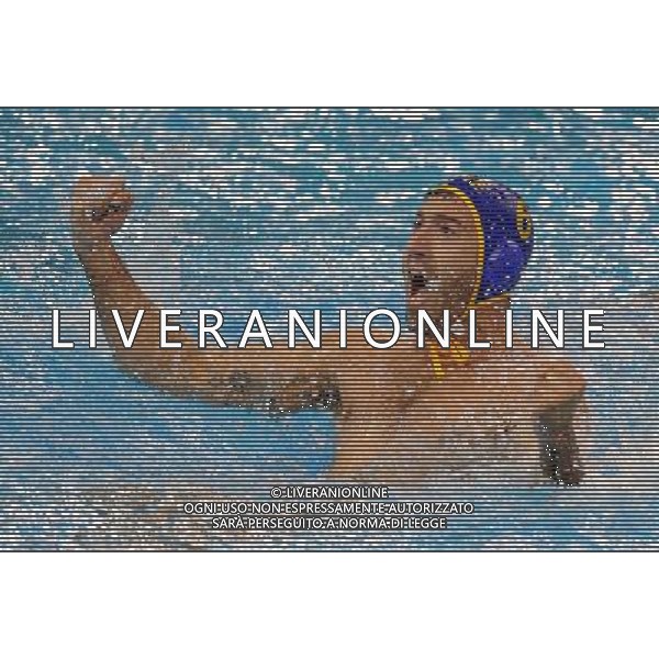 (110720) SHANGHAI, July 20, 2011 () Milan Ticic of Montenegro celebrates a point in the preliminary round of men\'s water polo event between Spain and Montenegro at the 14th FINA World Championships in Shanghai, east China, July 20, 2011. Montenegro won the match 9 7. (/Yang Lei)