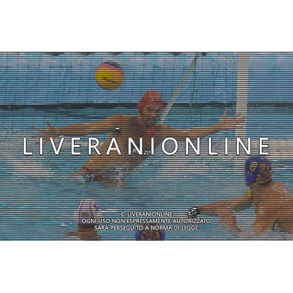 (110720) SHANGHAI, July 20, 2011 () Inaki Aguilar Morillo (up) of Spain defends a shot in the preliminary round of men\'s water polo event between Spain and Montenegro at the 14th FINA World Championships in Shanghai, east China, July 20, 2011. Montenegro won the match 9 7. (/Yang Lei) (sqq)