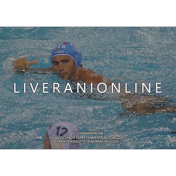 (110720) SHANGHAI, July 20, 2011 () Niccolo Gitto of Italy £®back) gestures in the preliminary round of men\'s water polo event between the United States and Italy at the 14th FINA World Championships in Shanghai, east China, July 20, 2011. Italy won the match 8 5. (/Yang Lei) (sqq)