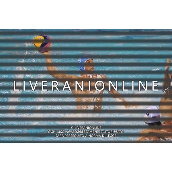 (110720) SHANGHAI, July 20, 2011 () Christian Presciutti (L) of Italy competes in the preliminary round of men\'s water polo event between the United States and Italy at the 14th FINA World Championships in Shanghai, east China, July 20, 2011. Italy won the match 8 5. (/Yang Lei) (sqq)