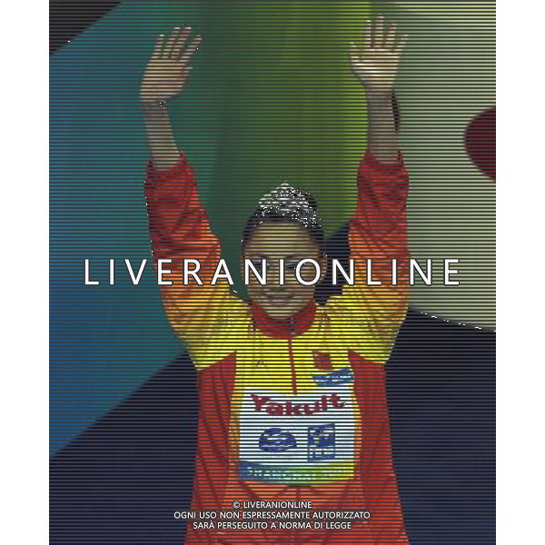 (110720) SHANGHAI, July 20, 2011 () Sun Wenyan of China waves to spectators at the awarding ceremony of the solo free synchronized swimming competition at the 14th FINA World Championships in Shanghai, east China, July 20, 2011. Sun Wenyan won the bronze medal with 95.840 points. (/Guo Yong)