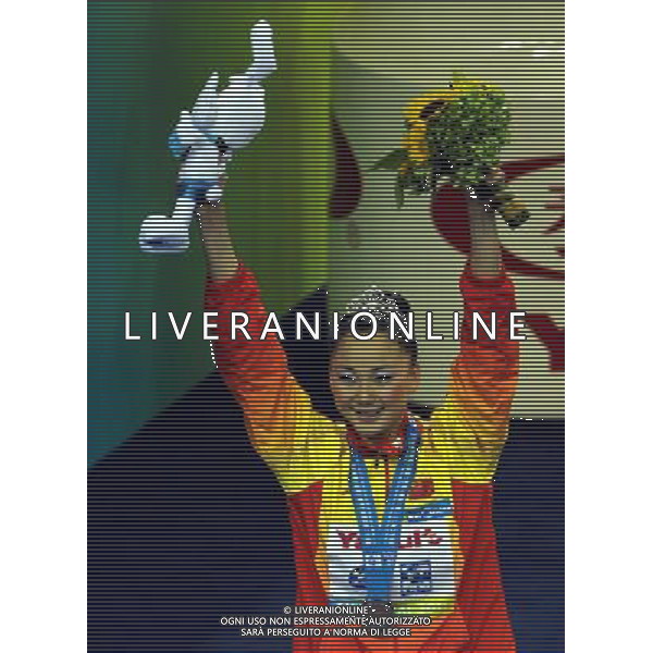 (110720) SHANGHAI, July 20, 2011 () Sun Wenyan of China waves to spectators at the awarding ceremony of the solo free synchronized swimming competition at the 14th FINA World Championships in Shanghai, east China, July 20, 2011. Sun Wenyan won the bronze medal with 95.840 points. (/Guo Yong)