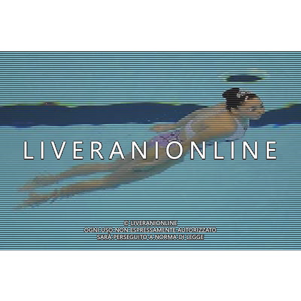 (110720) SHANGHAI, July 20, 2011 () Sun Wenyan of China competes in the final of the solo free synchronized swimming competition at the 14th FINA World Championships in Shanghai, east China, July 20, 2011. Sun won the bronze medal with 95.840 points. (/Guo Yong)