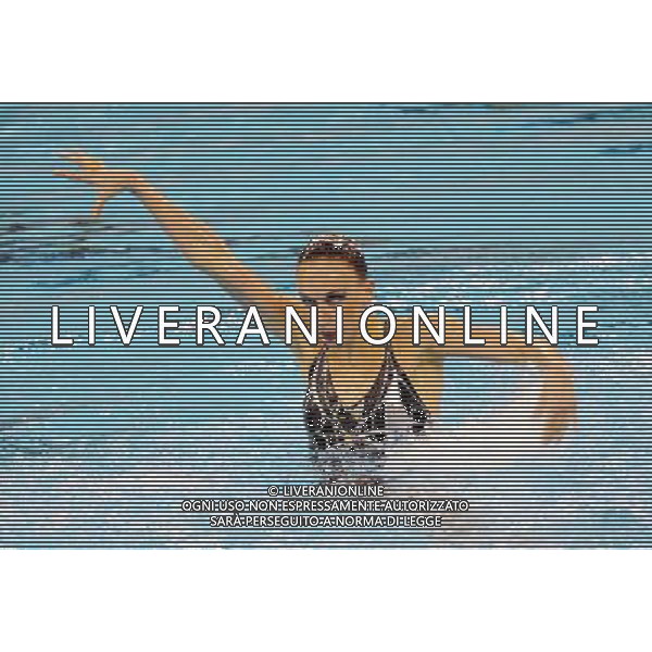 (110720) SHANGHAI, July 20, 2011 () Natalia Ishchenko of Russia competes in the final of the solo free synchronized swimming competition at the 14th FINA World Championships in Shanghai, east China, July 20, 2011. Natalia Ishchenko claimed the title with 98.550 points. (/Yang Zongyou) (zgp)