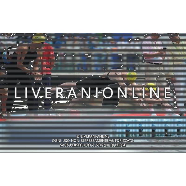 (110721) -- SHANGHAI, July 21, 2011 () -- Melissa Gorman, Ky Hurst, and Rhys Mainstone of Australia start in the open water 5km team event at the 14th FINA World Championships in Shanghai, east China, July 21, 2011. The Australian team won the silver medal with 57:01.8. (/Guo Yong) (zgp)