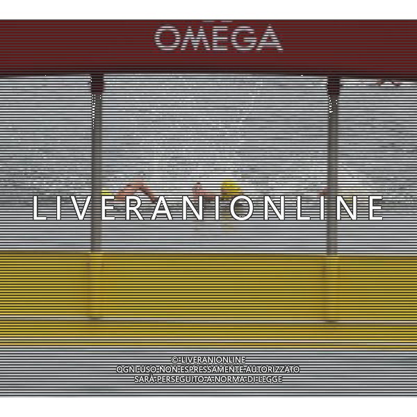 (110721) -- SHANGHAI, July 21, 2011 () -- Andrew Gemmell, Ashley Grace Twichell, and Sean Ryan of the United States swim towards the finish line in the open water 5km team event at the 14th FINA World Championships in Shanghai, east China, July 21, 2011. The U.S. team claimed the title with 57:00.6. (/Guo Yong) (zgp)