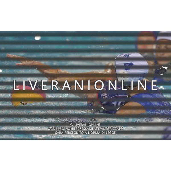 (110721) -- SHANGHAI, July 21, 2011 () -- Olga Belyaeva (L) of Russia and Ilektra Maria Psouni of Greece vie for the ball in the preliminary round of women\'s water polo event between Greece and Russia at the 14th FINA World Championships in Shanghai, east China, July 21, 2011. Greece won the match 6-5. (/Wang Yuguo) (sqq)