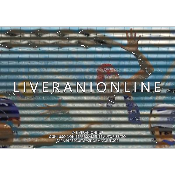 (110721) -- SHANGHAI, July 21, 2011 () -- Maria Kovtunovskaya (back) of Russia defends a shot in the preliminary round of women\'s water polo event between Greece and Russia at the 14th FINA World Championships in Shanghai, east China, July 21, 2011. Greece won the match 6-5. (/Wang Yuguo) (sqq)