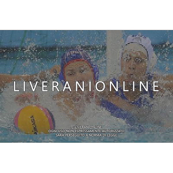 (110721) -- SHANGHAI, July 21, 2011 () -- Ekaterina Lisunova (L) of Russia competes in the preliminary round of women\'s water polo event between Greece and Russia at the 14th FINA World Championships in Shanghai, east China, July 21, 2011. Greece won the match 6-5. (/Wang Yuguo) (sqq)